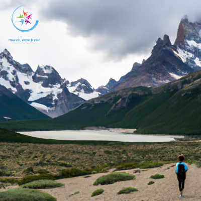 the awe-inspiring beauty of Patagonia's scenic trails: a lone hiker, dwarfed by towering snow-capped peaks, traverses a narrow path snaking through lush valleys, with turquoise lakes glistening in the distance